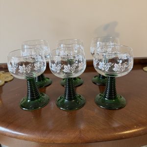 Set of six vintage clear glass Roemer wine glasses with green beehive stems.