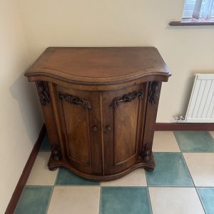 Victorian-era mahogany demilune cabinet / desk