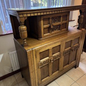 Antique carved oak court cabinet