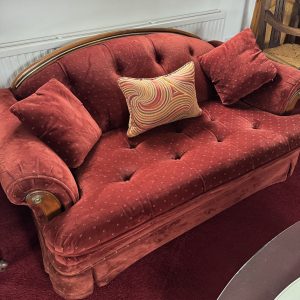 Antique Red velvet boudoir sofa with wooden trim