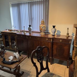 Vintage flame mahogany regency revival break front sideboard made by Epstein of London