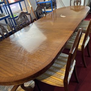 Vintage regency style mahogany twin pedestal extending dining table with eight chairs
